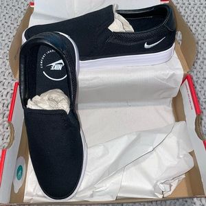 Brand new Nike slip on sneakers